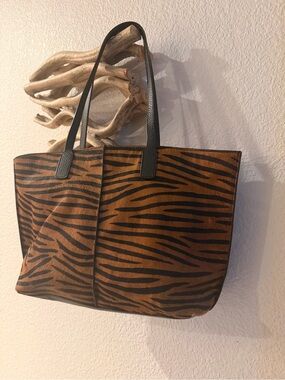 CHICO’s Leather hair Tiger Tote Bag oversized purse retails $169